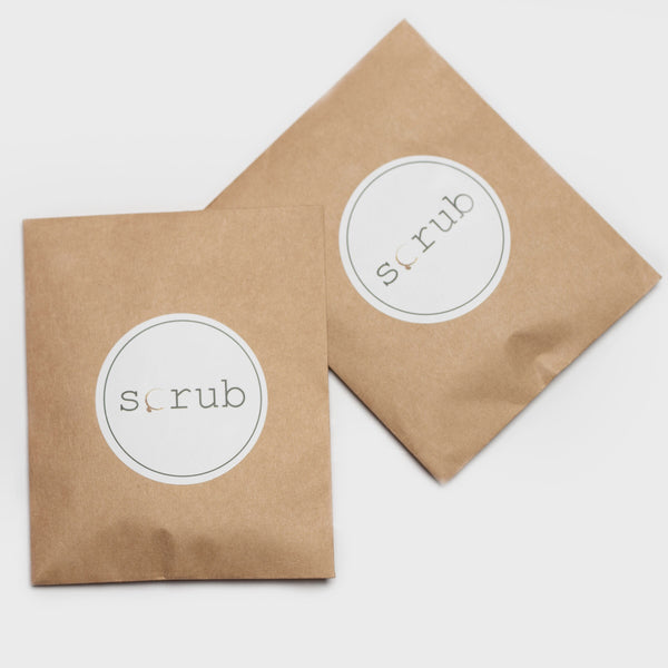 brown packet with scrub logo